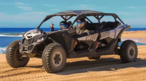 Can-Am Maverick X3 recorriendo la playa en tour extremo con vista al océano en Los Cabos